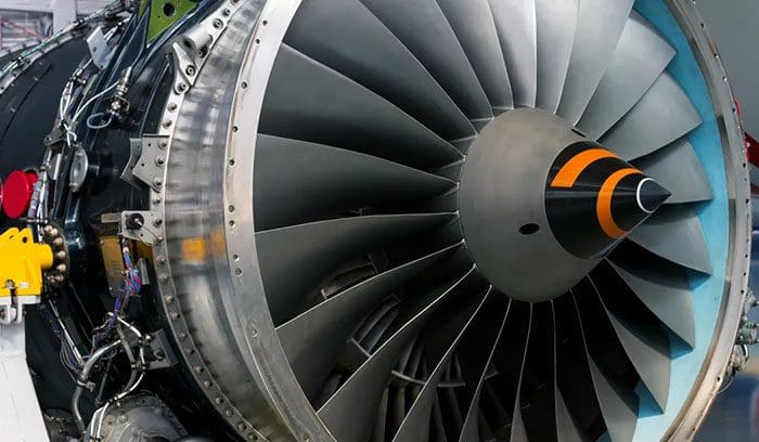 A close up of the front end of an airplane engine.