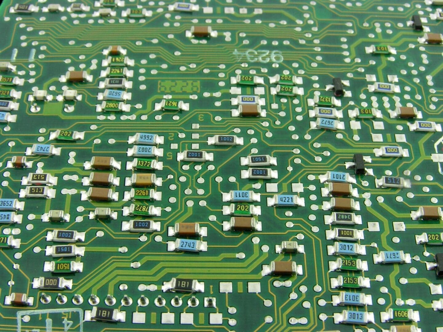 A close up of the circuit board with many houses