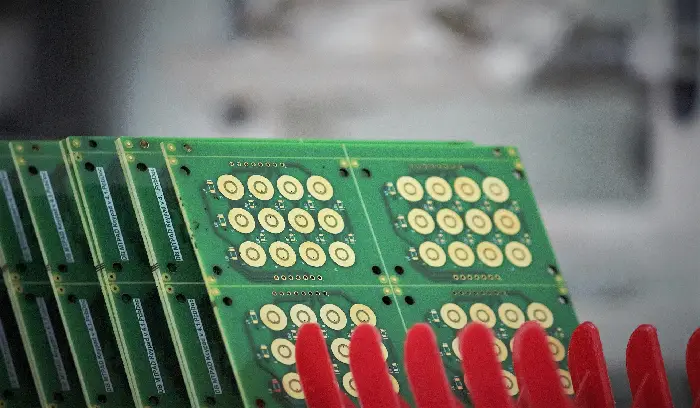A close up of several boards with red fingers