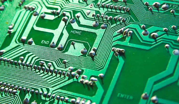 A close up of the circuit board of an electronic device.