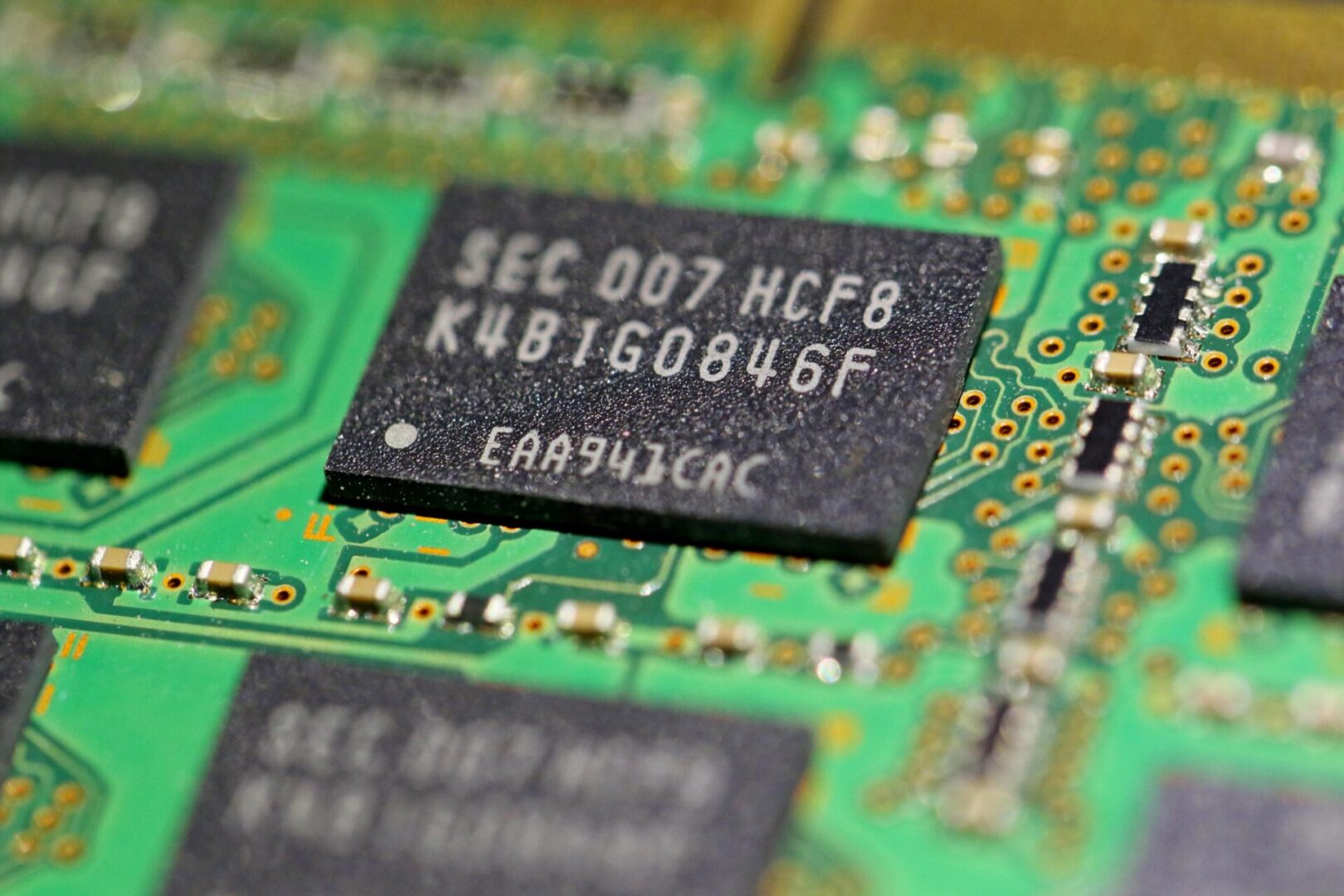 A close up of the chip on an electronic device.