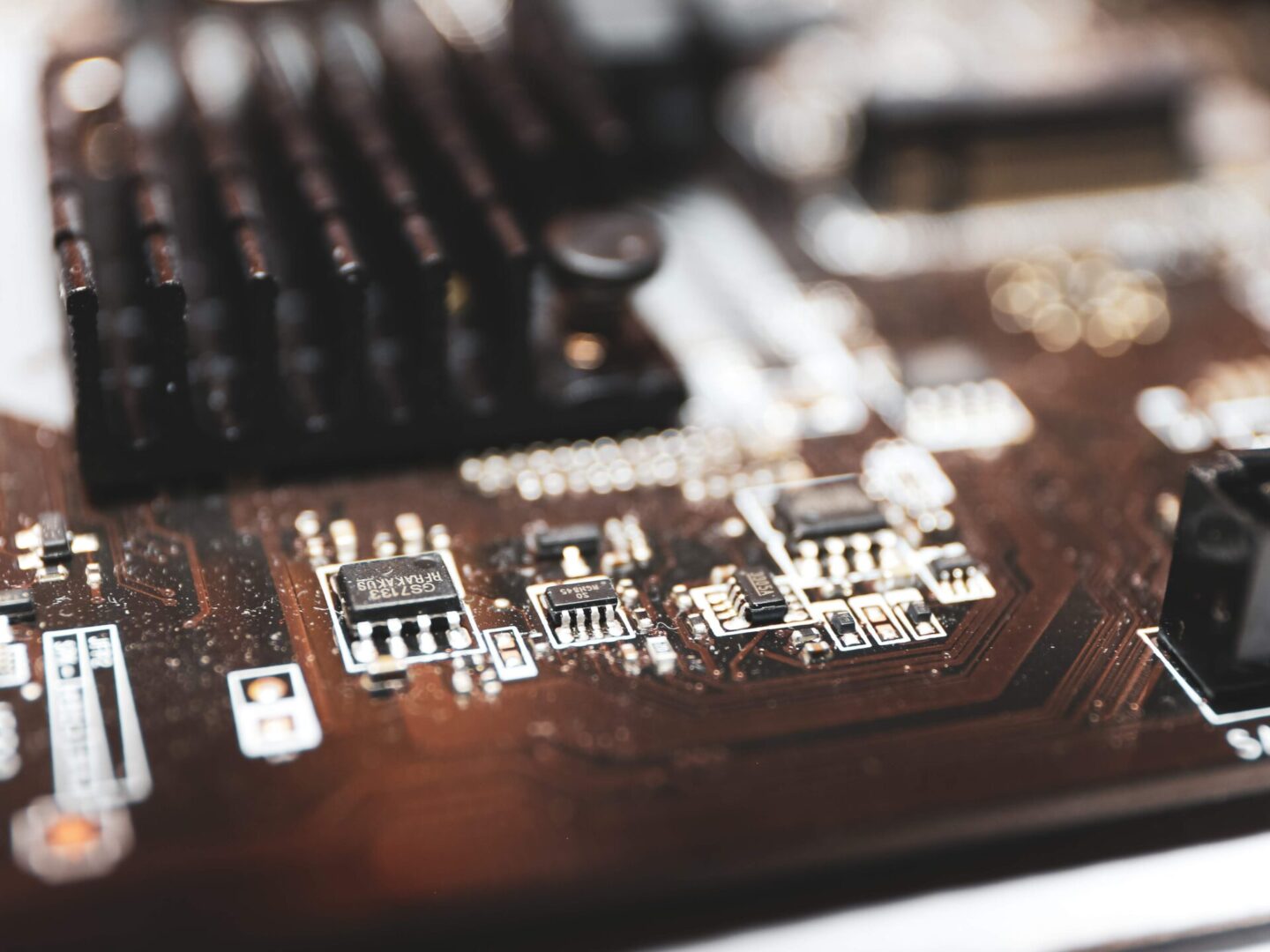 A close up of the electronic components on a computer.