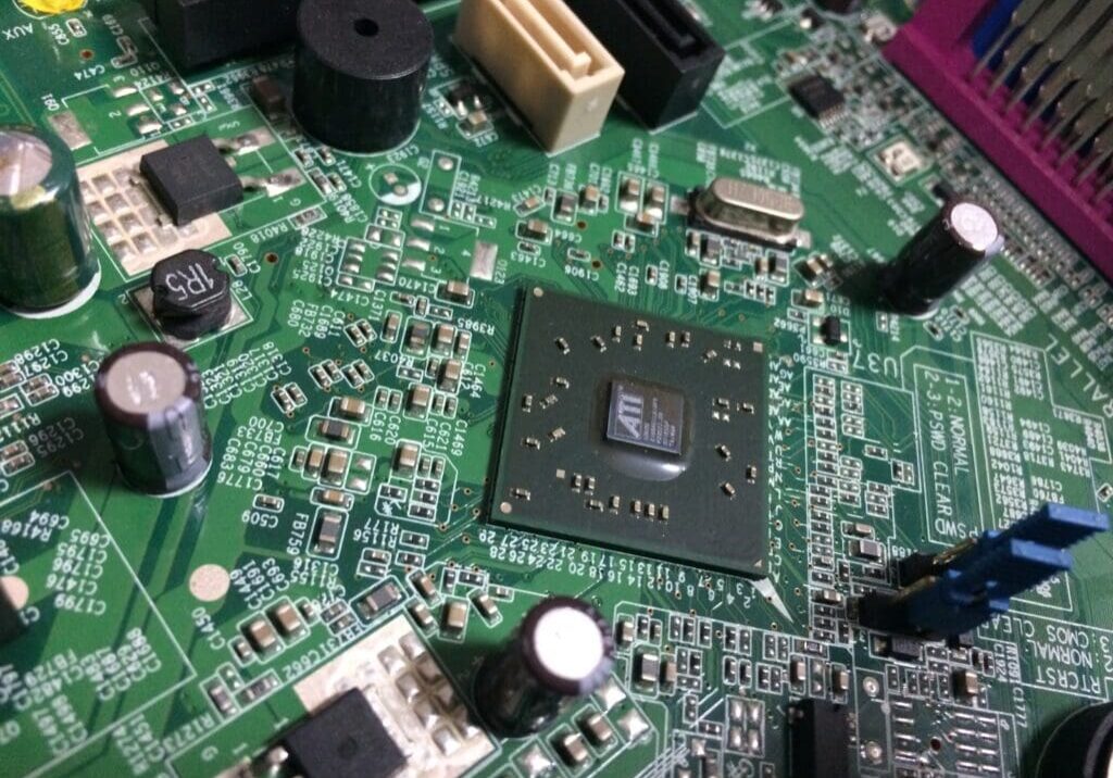 A close up of the electronics on top of a computer.